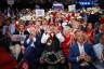 Attendees listen to speakers on the fourth day of the Republican National Convention.