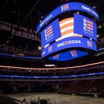 A jumbotron with DNC 2024 signage is seen at The United Center, the site of the 2024 Democratic National Convention.