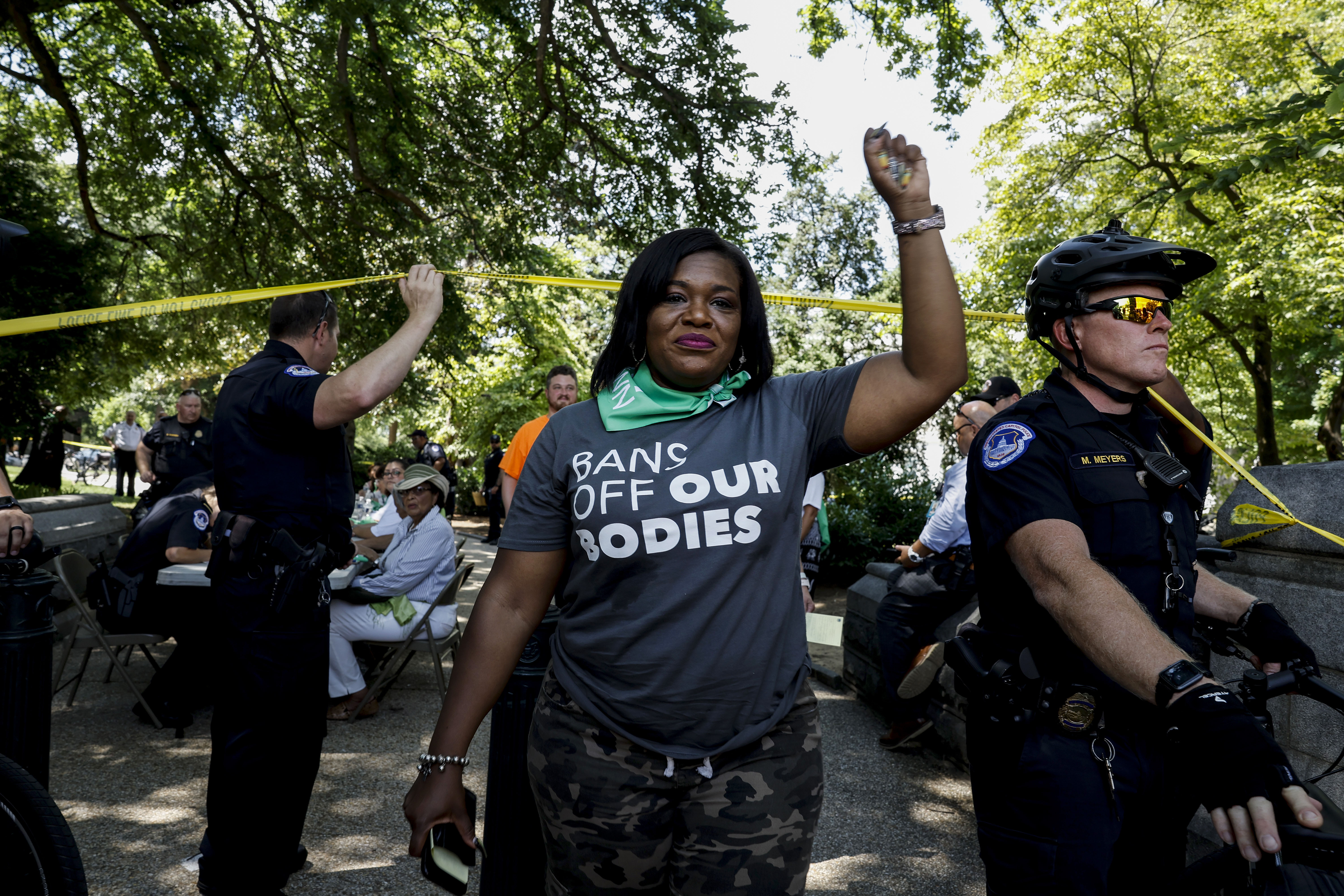 Rep. Cori Bush leaves a processing area after being arrested for participating in a sit-in in support of abortion rights.