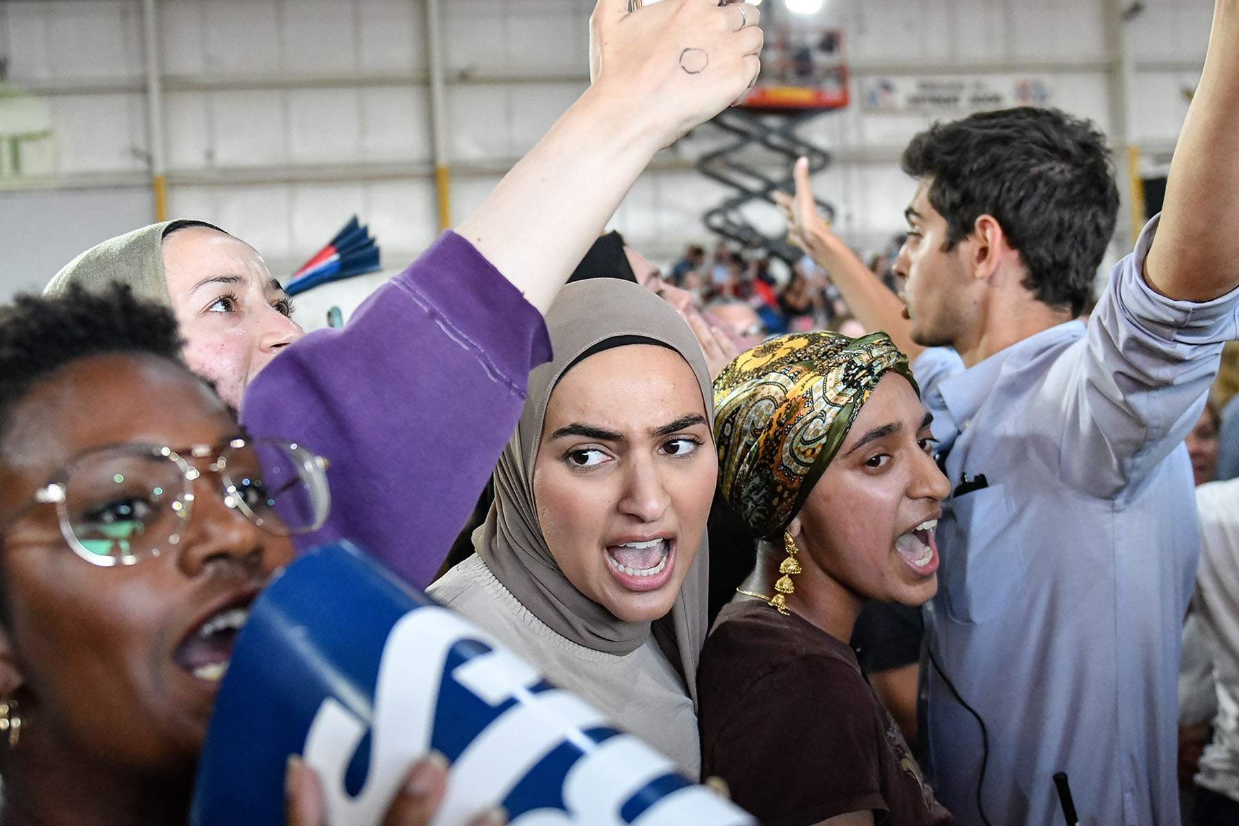 Pro-Palestine protestors disrupt Vice President Kamala Harris's speech with chants at her presidential campaign rally at Detroit Metropolitan Wayne County Airport.