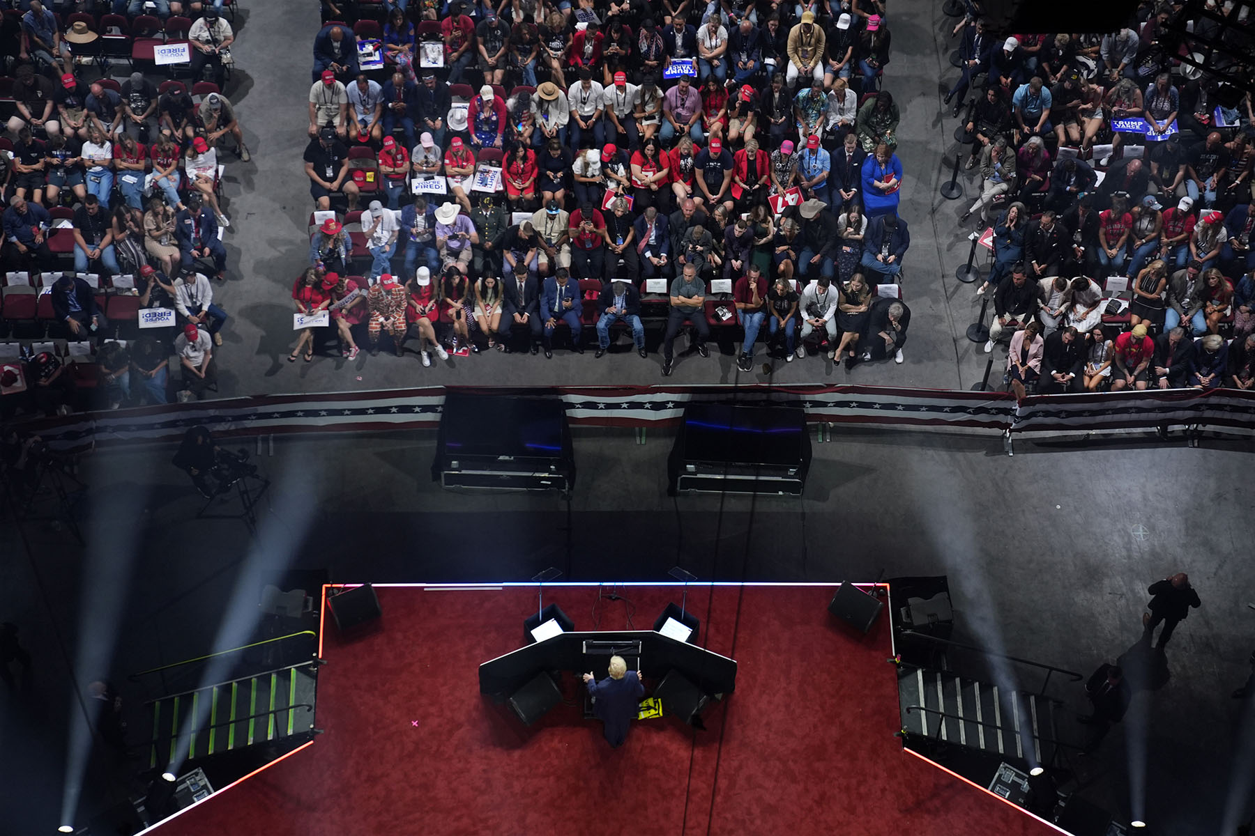 Overhead view of Donald Trump addressing the audience at a 2024 campaign rally in Glendale, Arizona.