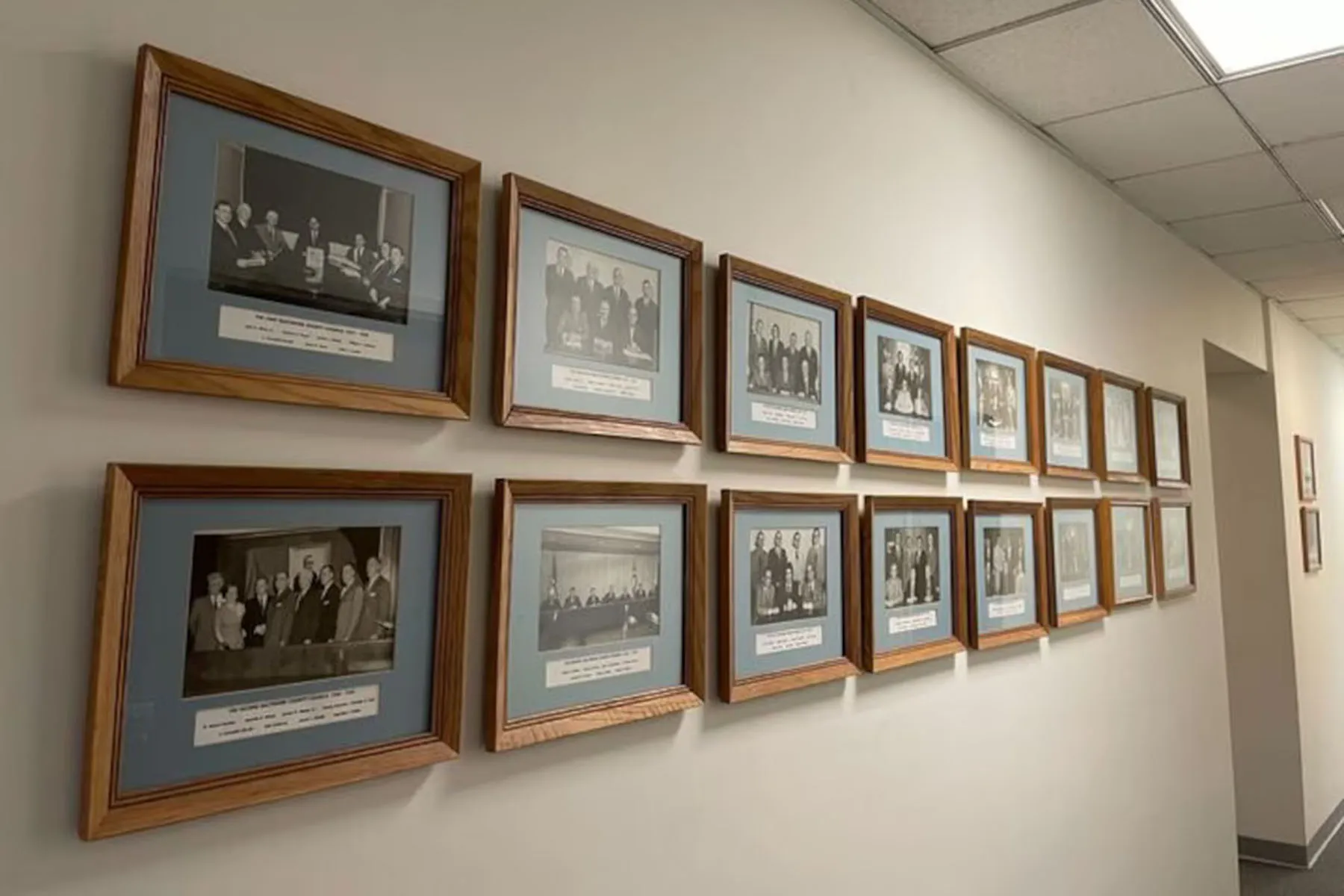 Images of the governing body are displayed in halls of the council offices. Most of them show tables of white men.