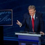 Former President Trump gestures as he debates Vice President Kamala Harris.