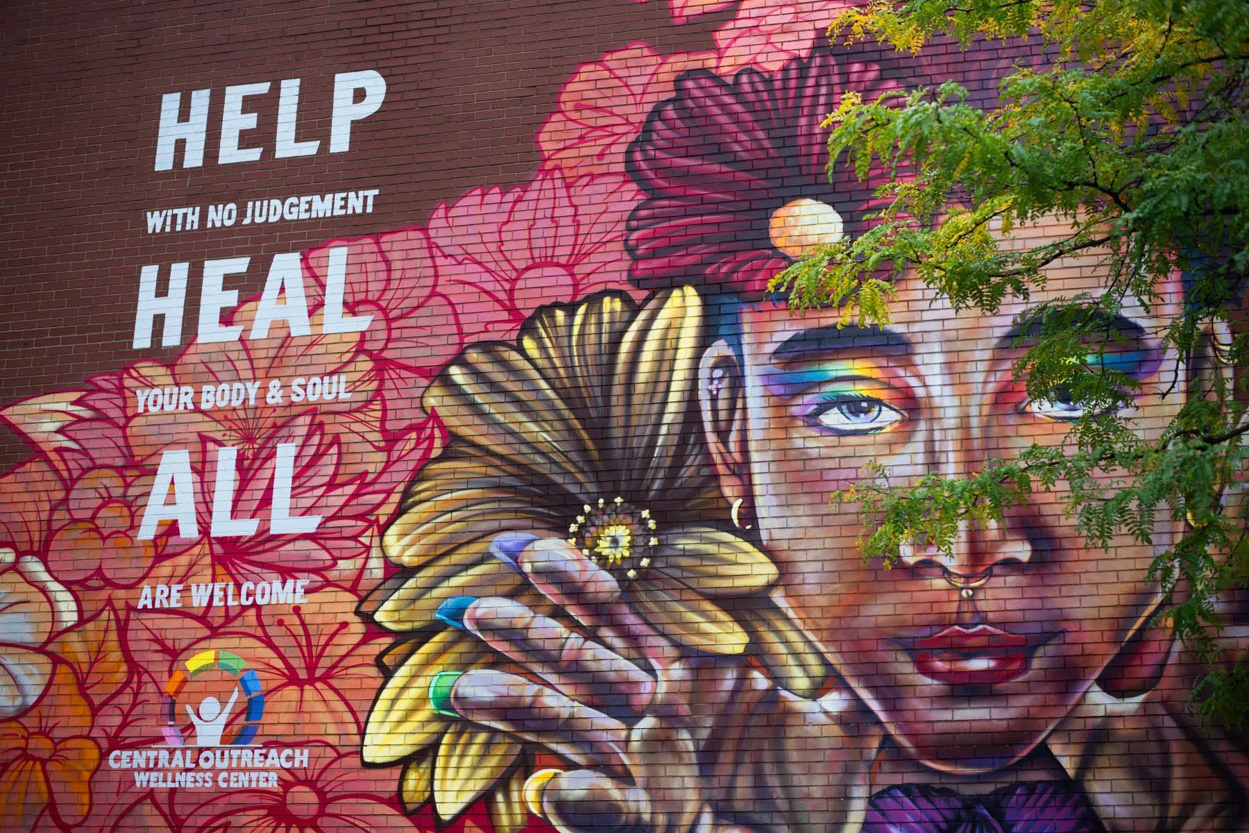 A mural outside of Central Outreach Wellness Center.