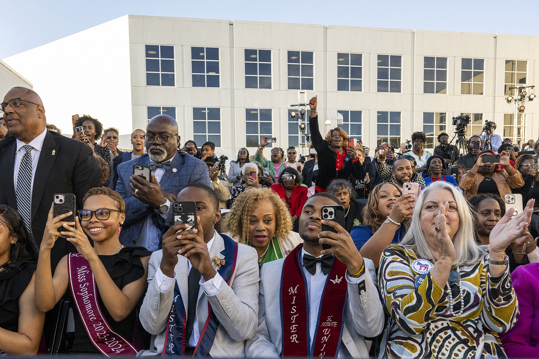 Supporters cheer as Vice President Kamala Harris (out of frame) arrives to speak at South Carolina State University.