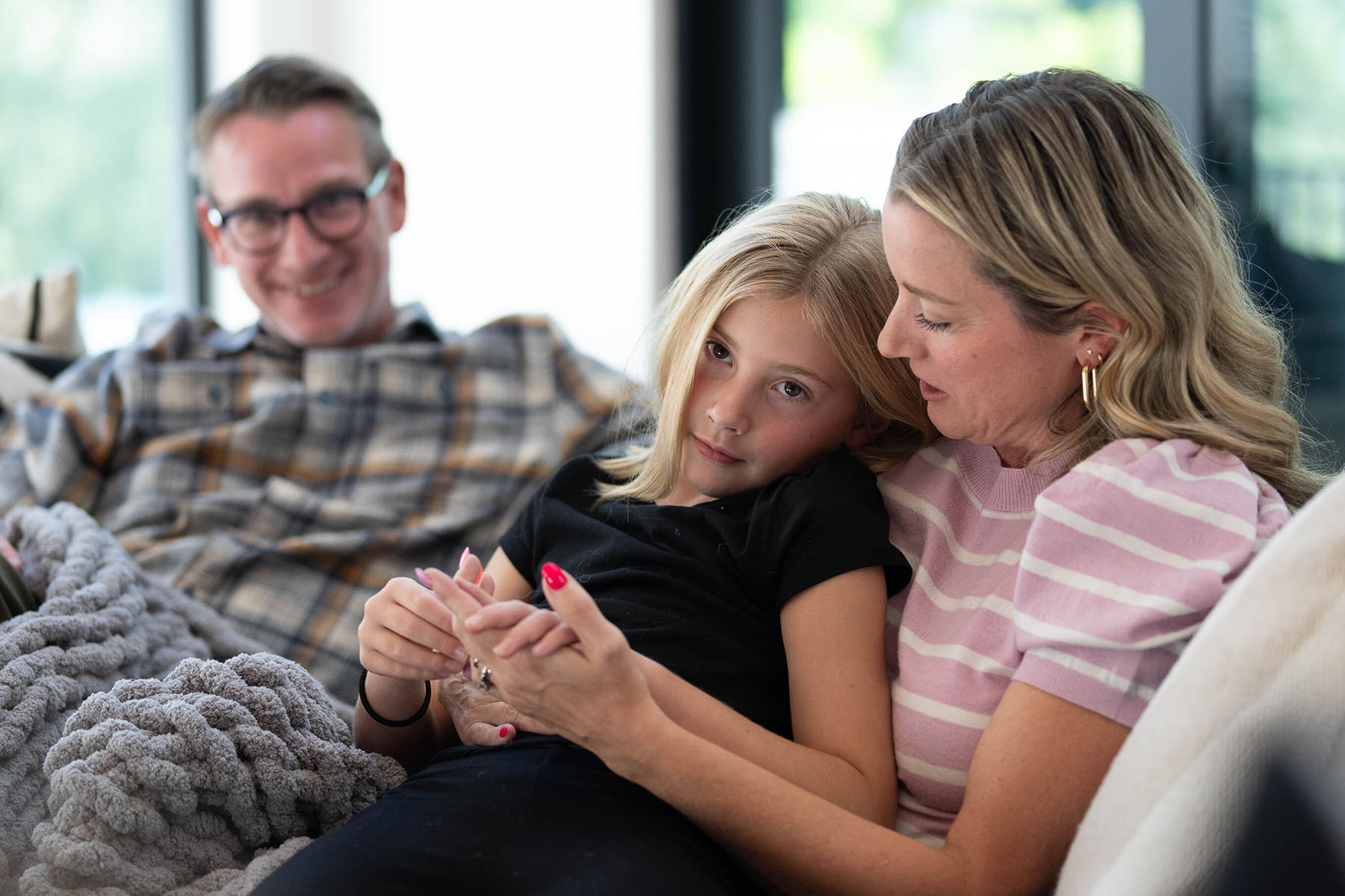 Travis Smith, running for Utah House District 42, talks about his campaign alongside his wife Tillia and their daughter Margot, 7.