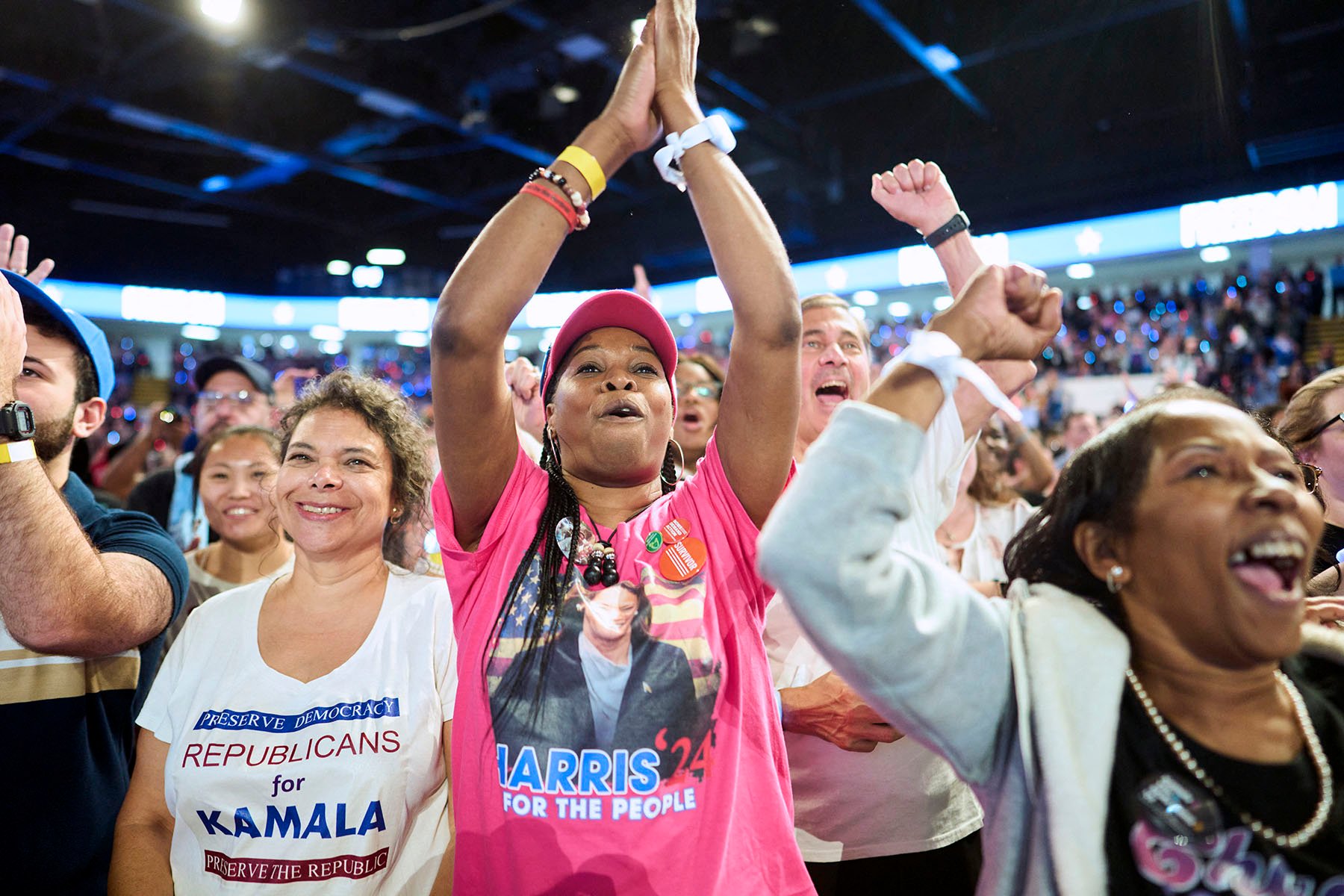 Supporters cheer as Vice President Kamala Harris speaks during a campaign event in Flint, Michigan.