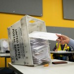 Absentee ballots are prepared to be mailed to military and overseas citizens at the Wake County Board of Elections in Raleigh, North Carolina.