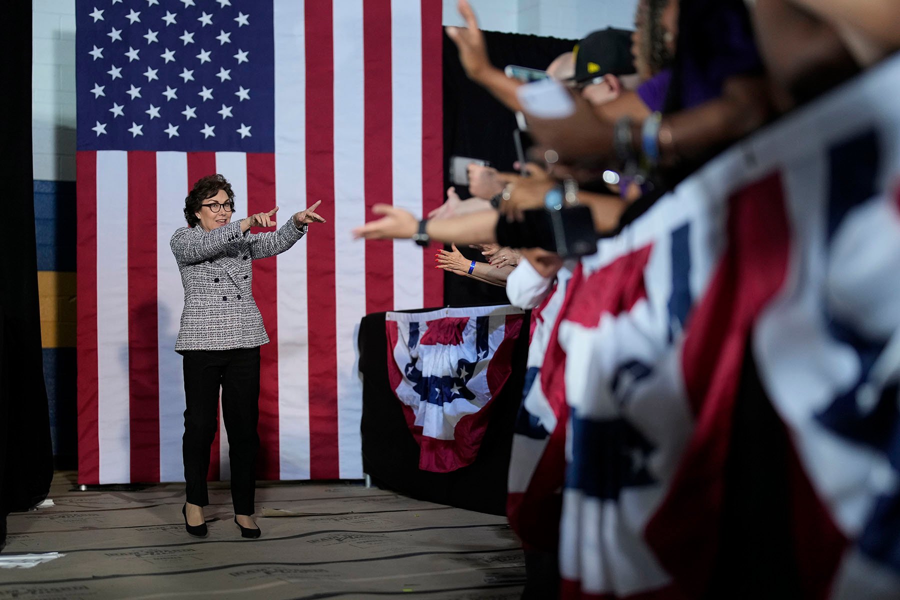 Sen. Jacky Rosen walks on stage to speak during a campaign rally supporting Vice President Kamala Harris in North Las Vegas, Nevada.