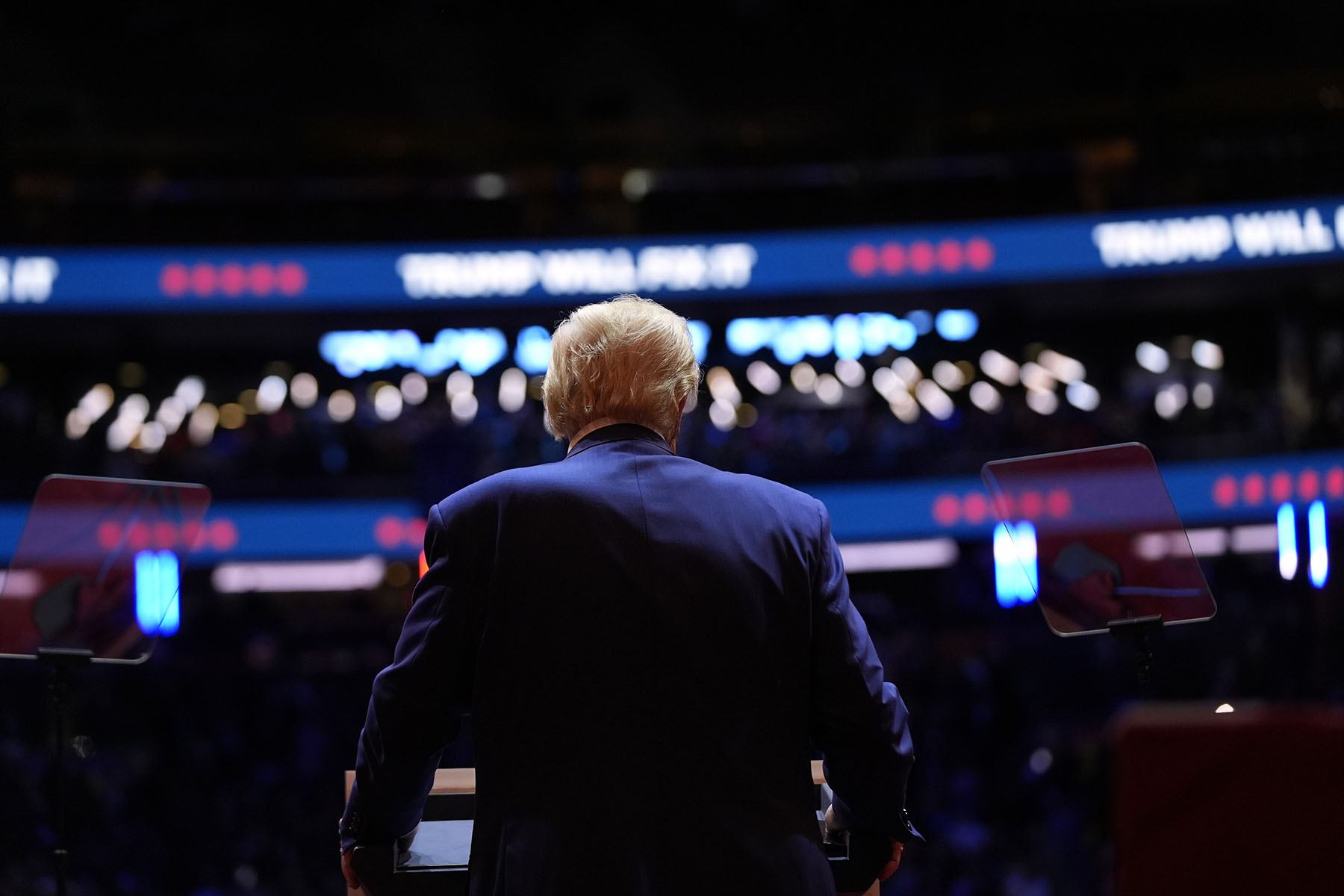 Former President Donald Trump, seen from the back, speaks at a campaign rally at Madison Square Garden.