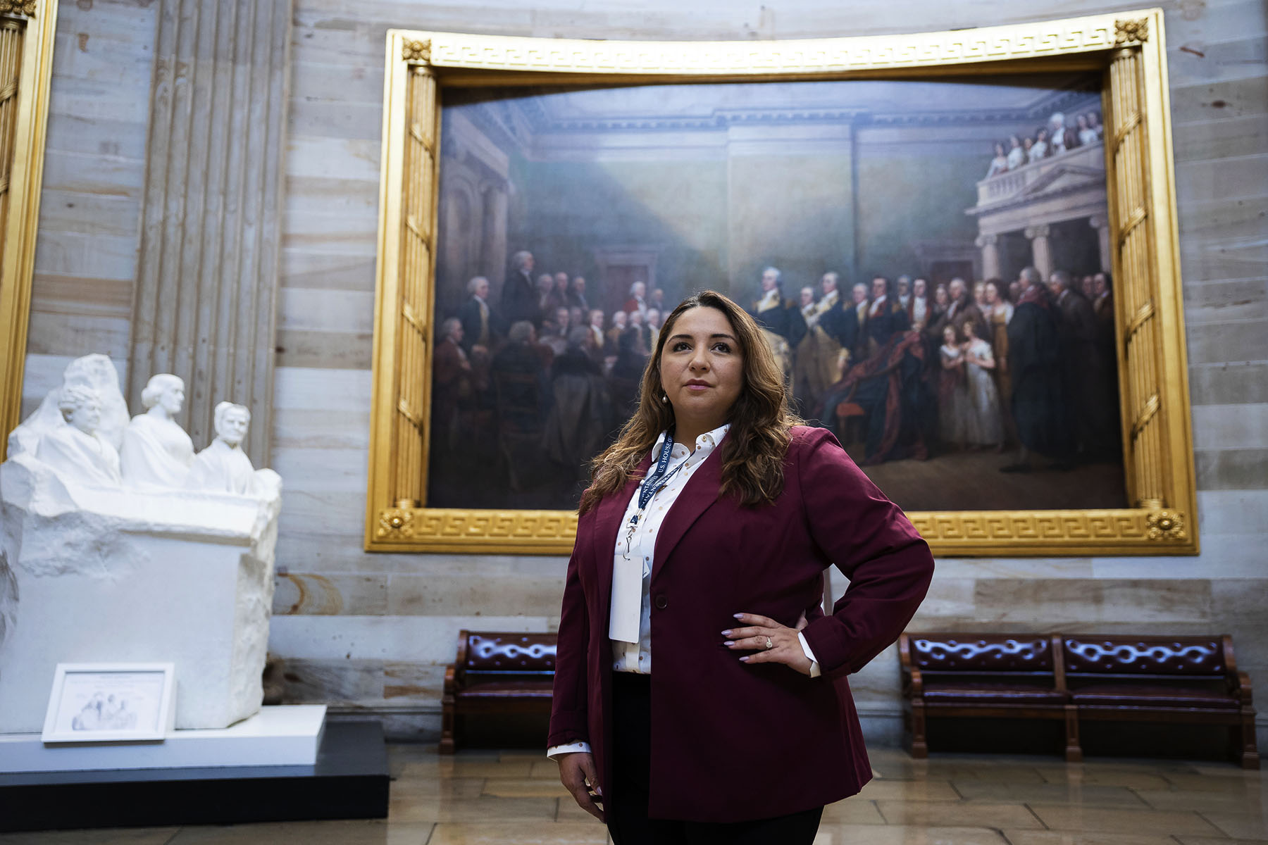 Rep. Delia Ramirez stands in the Capitol Rotunda.