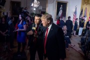 President Donald Trump appears on Fox&Friends with co-host Pete Hegseth during an event in the East Room of the White House.