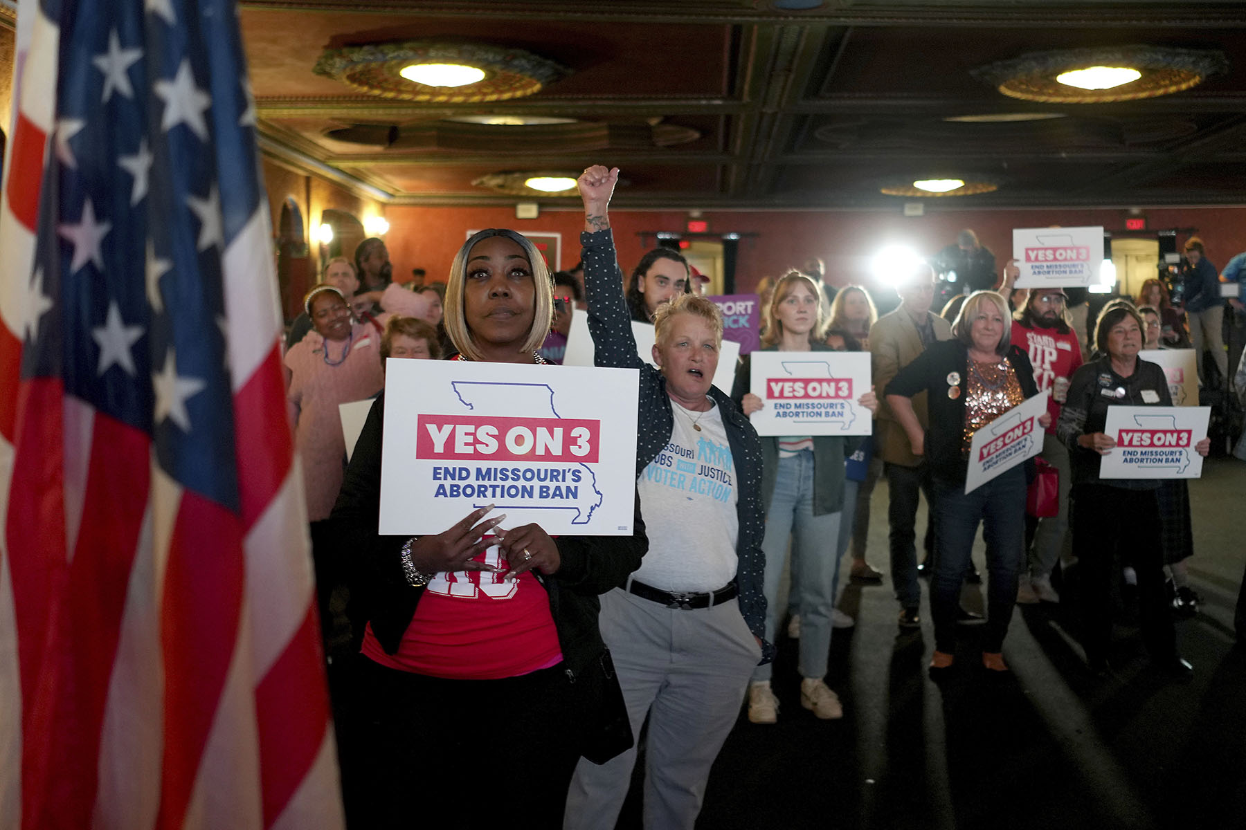 People at an election night watch party react after an abortion rights amendment to the Missouri constitution passed.