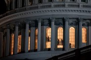 People are seen walking up stairs through windows at the top of the Capitol dome.