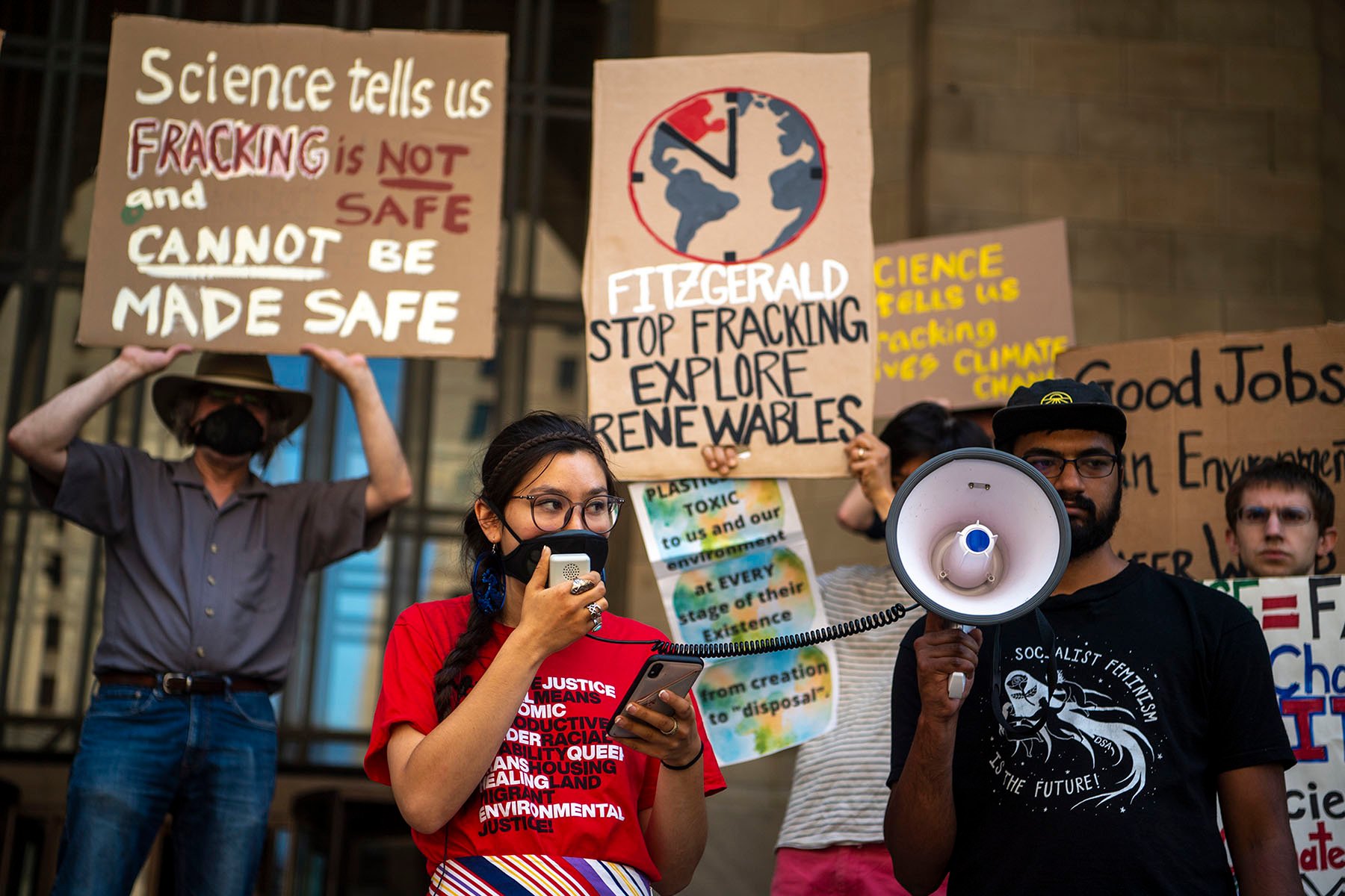 An activist speaks at an anti-fracking rally outside the City-County Building in downtown Pittsburgh.