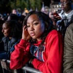 Student Brielle Jackson listens to polling results during an election night event for Vice President Kamala Harris at Howard University.