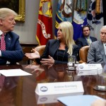 President Donald Trump and former Attorney General Jeff Sessions listen as then-Florida Attorney General Pam Bondi speaks in the Roosevelt Room of the White House.