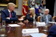 President Donald Trump and former Attorney General Jeff Sessions listen as then-Florida Attorney General Pam Bondi speaks in the Roosevelt Room of the White House.