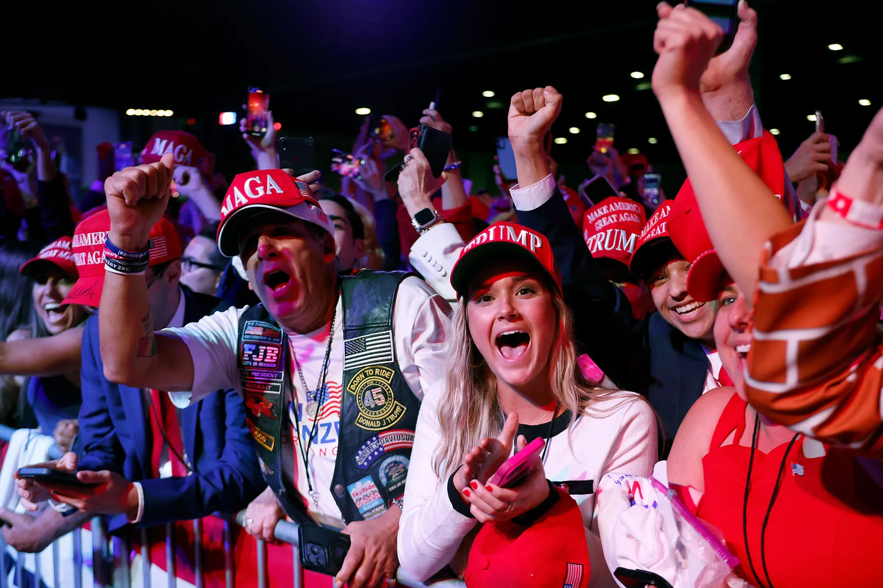 Supporters react as Fox News projects former President Donald Trump is elected president during an election night event at the Palm Beach Convention Center.