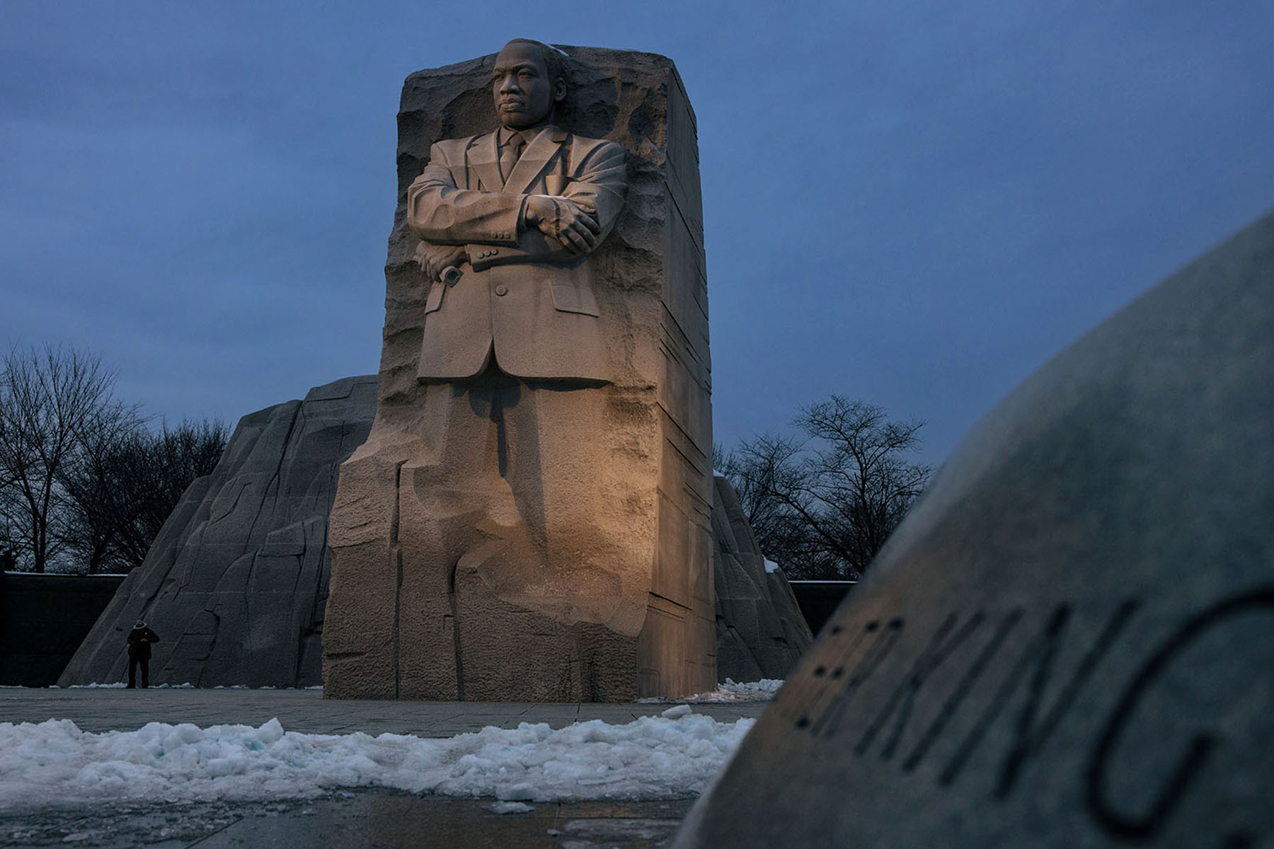 People visit the Martin Luther King, Jr. Memorial along the National Mall's Tidal Basin.