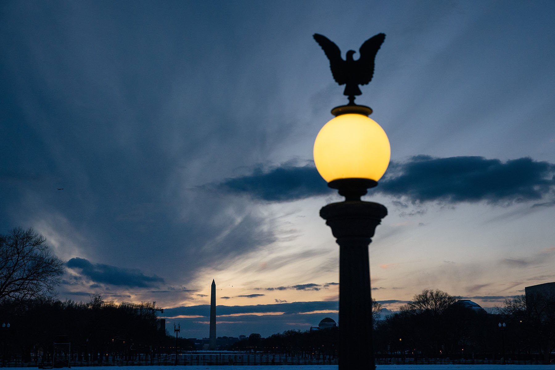 Light fixtures at the Ulysses S. Grant Memorial lie between the Capitol and the Washington Monument.