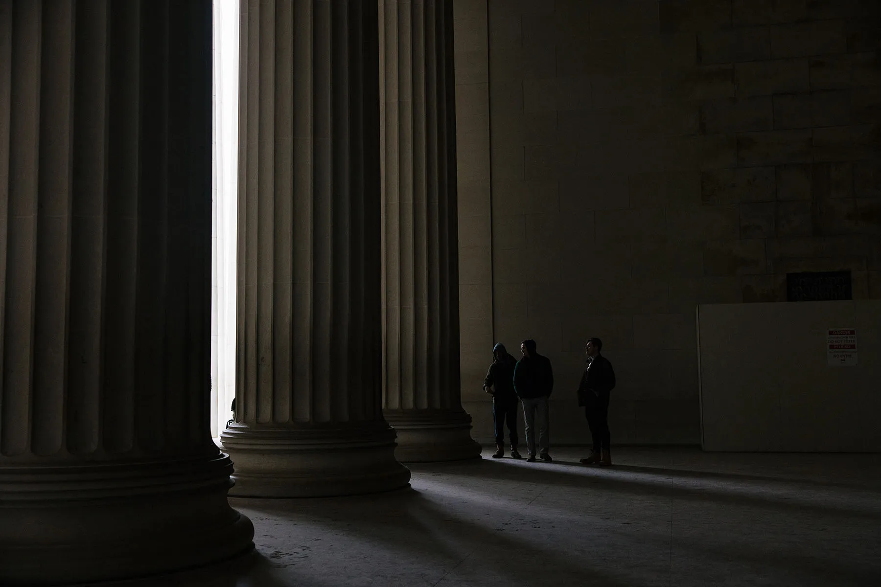 People visit the Lincoln Memorial, which is currently under construction.