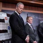 From left, Senate Majority Leader John Thune, Sen. James Lankford, and Sen. Ted Budd talk to reporters about the Laken Riley Act at the Capitol in Washington, D.C.