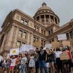 Abortion rights demonstrators rally in front of the Texas State Capitol in Austin, Texas.