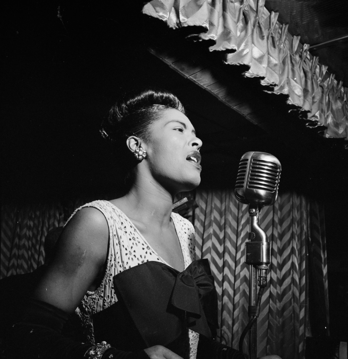 A portrait of Billie Holiday.