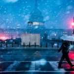 The Capitol dome is seen as snow falls after a winter storm warning was issued on Capitol Hill.