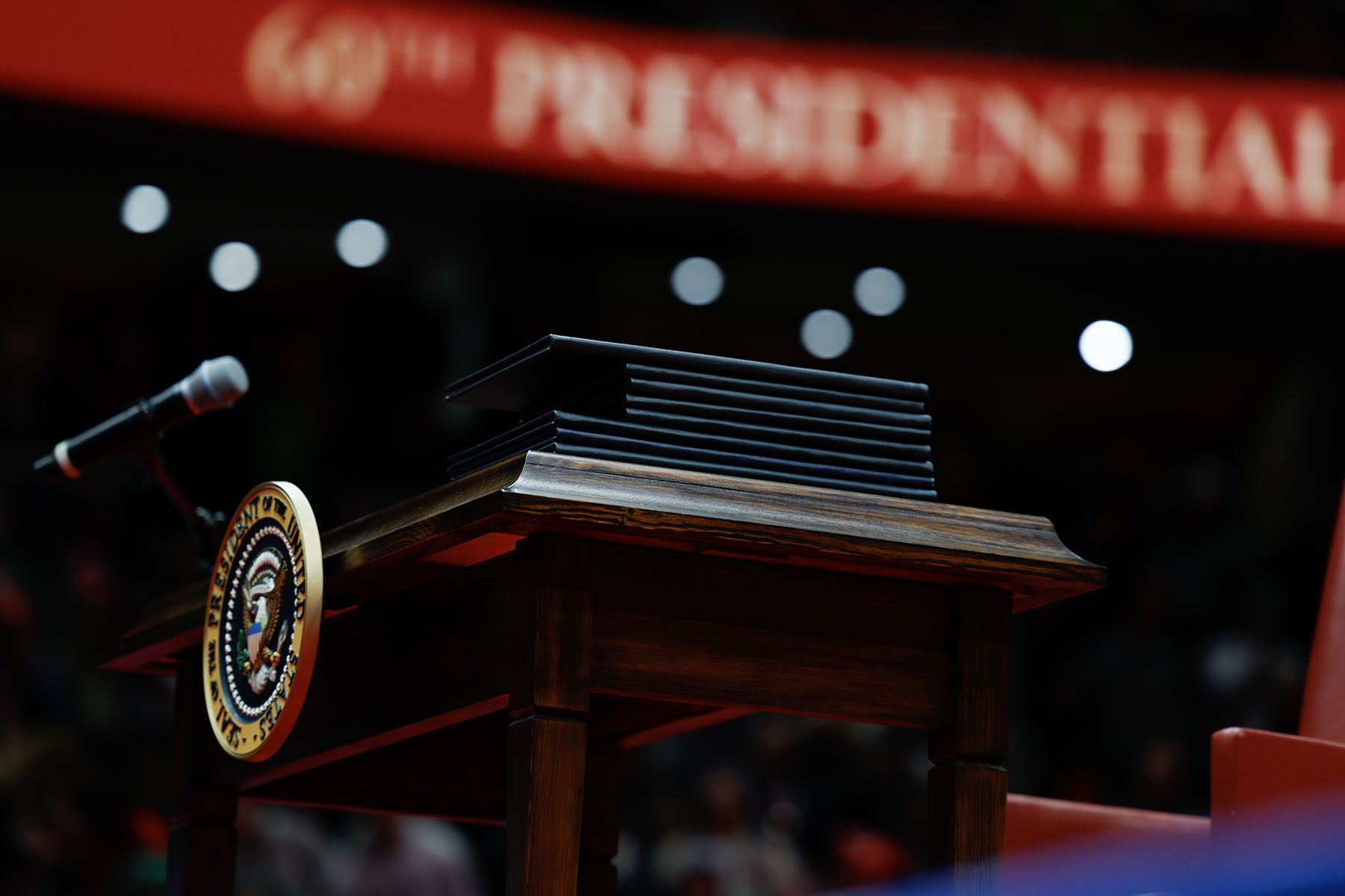 Executive orders sit on a desk for President Donald Trump to sign during an indoor inauguration parade at the Capital One Arena.