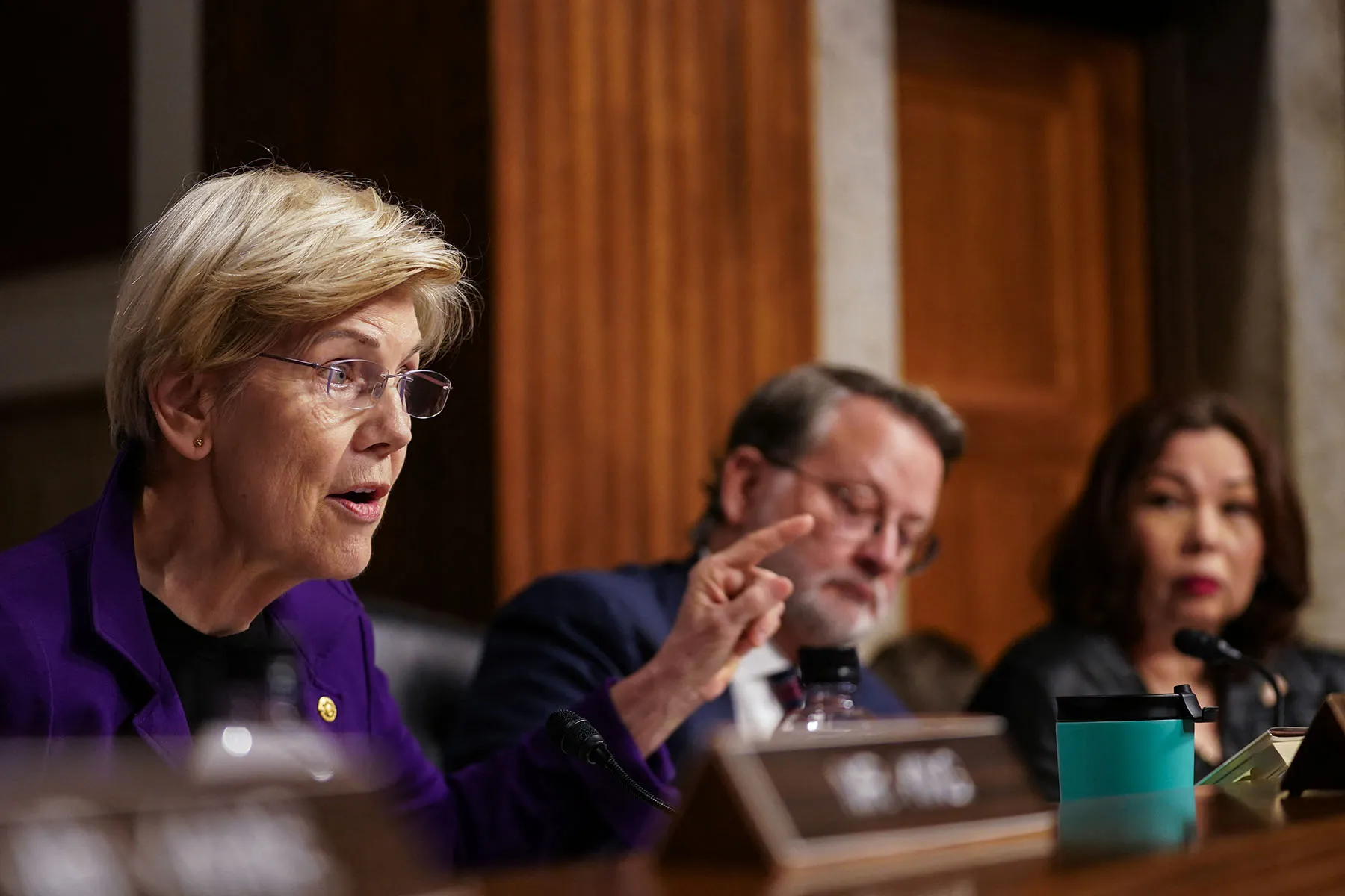 Sen. Elizabeth Warren questions Pete Hegseth during his confirmation hearing before the Senate Armed Services Committee.