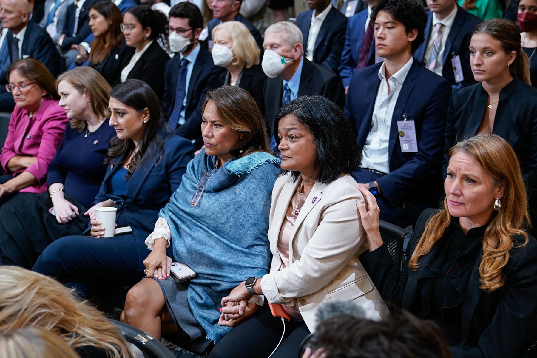 Rep. Pramila Jayapal and Rep. Veronica Escobar, hold each other as the House select committee investigating the Jan. 6 attack on the Capitol holds a primetime hearing on Capitol Hill.