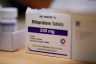 A box of Mifepristone abortion pill tablets sits on a counter.