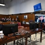 Trump attorney Emil Bove looks on as President-elect Donald Trump appears remotely for a sentencing hearing.