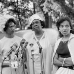 Diane Nash (right) representing the Southern Christian Leadership Committee, is interviewed as she leaves the White House