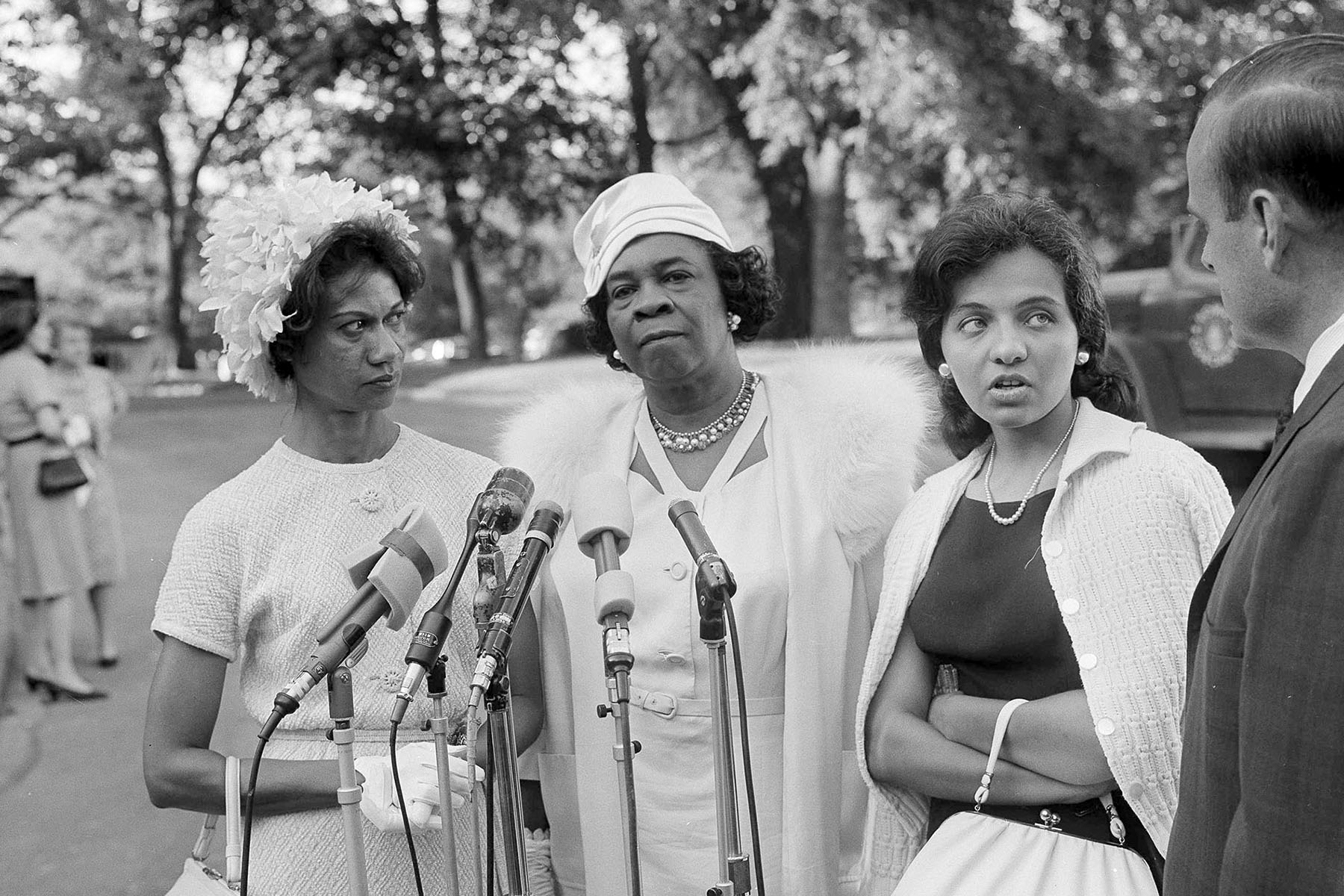 Diane Nash (right) representing the Southern Christian Leadership Committee, is interviewed as she leaves the White House