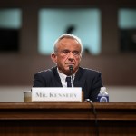 Robert F. Kennedy Jr. testifies during his Senate Finance Committee confirmation hearing at the Dirksen Senate Office Building