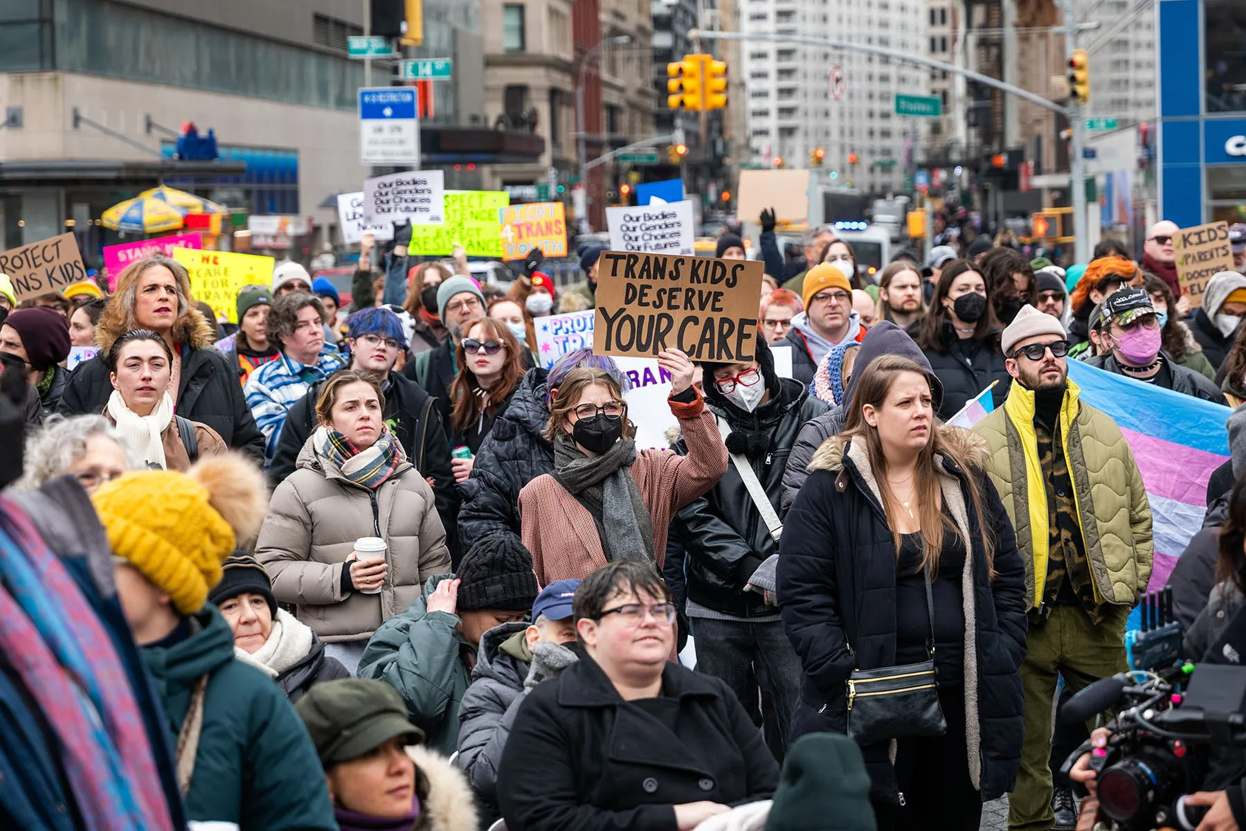 People attend a rally supporting transgender youth in New York City.