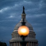 The Capitol Dome is seen as the sun sets on Capitol Hill.