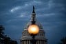 The Capitol Dome is seen as the sun sets on Capitol Hill.