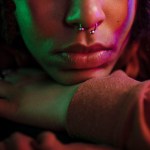 close up of a non-binary person wearing nose ring