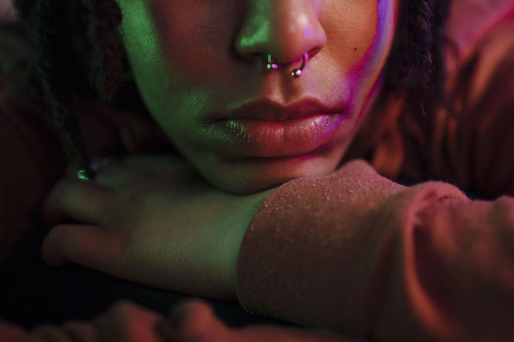 close up of a non-binary person wearing nose ring