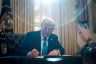 President Donald Trump signs executive orders in the Oval Office at the White House.