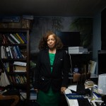 Dr. Helen Jackson poses for a portrait in one of her home offices.