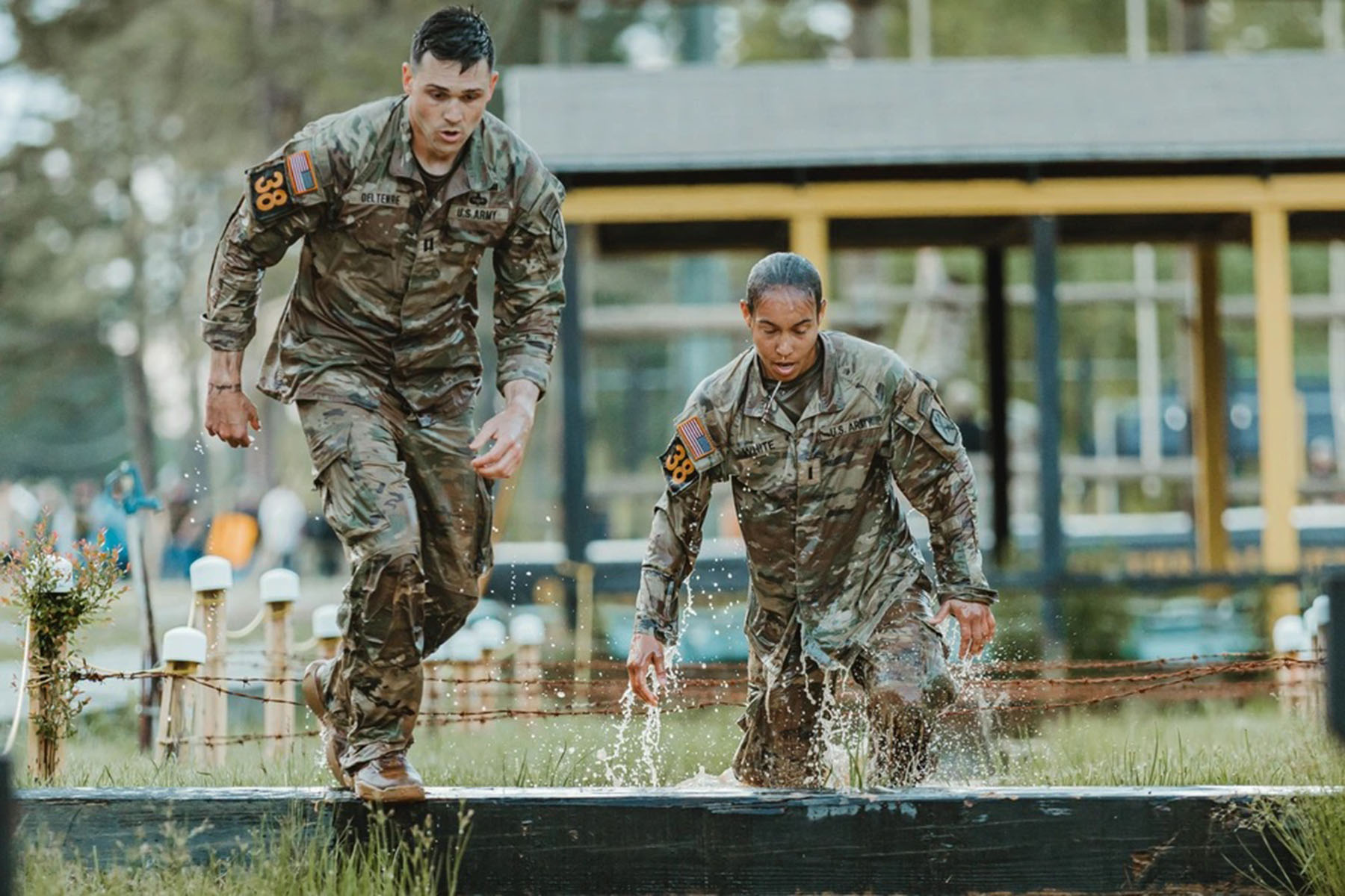 1st Lt. Gabrielle White (right) competes in the 2025 Best Ranger Competition at Camp Rogers, Fort Benning, Georgia.
