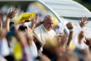 Pope Francis arrives to celebrate a mass in Asuncion, Paraguay.