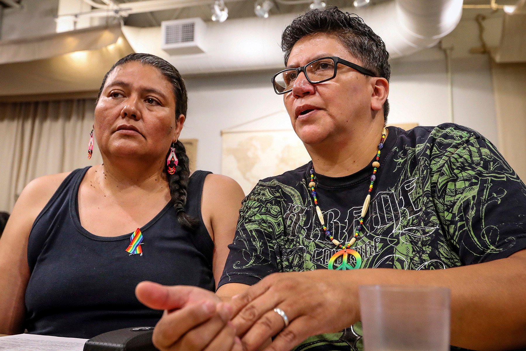 Two women sit together.