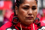 A demonstrator looks on during the annual Missing & Murdered Indigenous Women, People & Families march in Seattle.