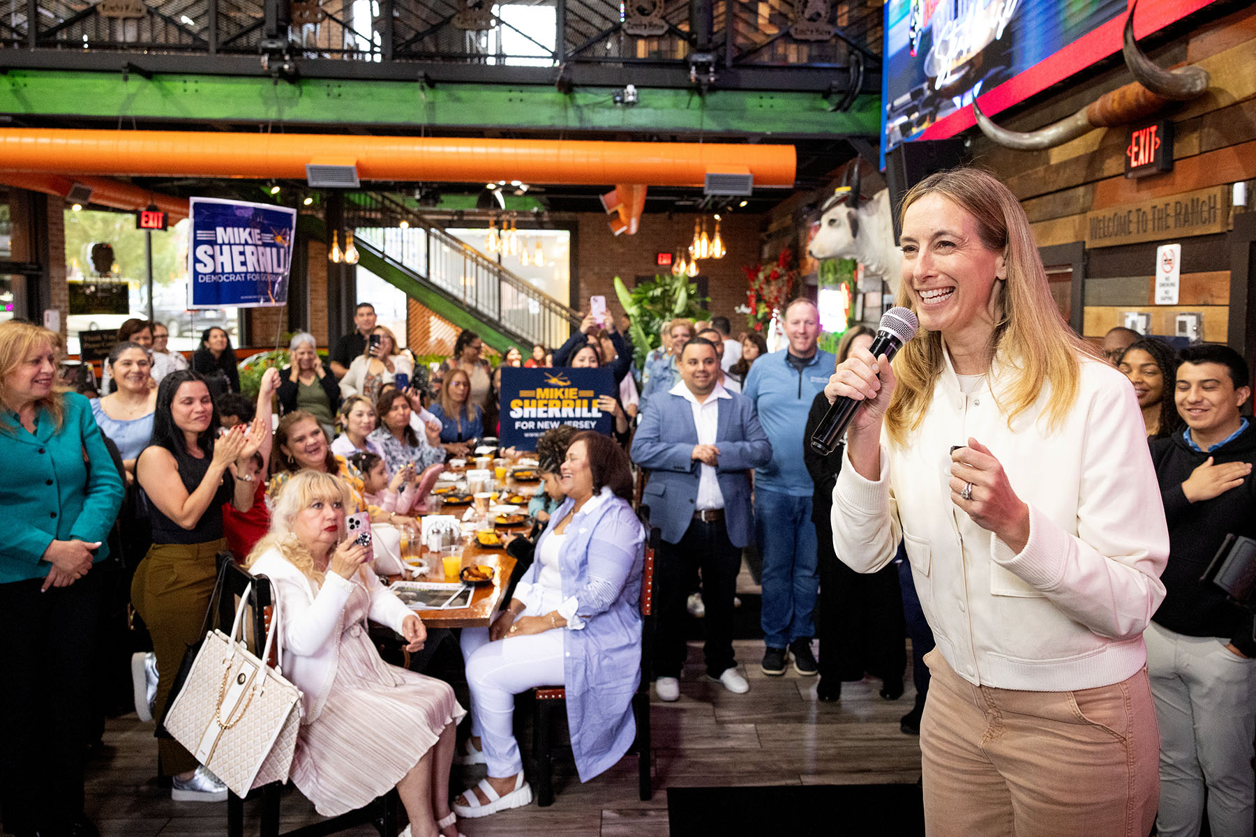 Democratic candidate for Governor Rep. Mikie Sherrill speaks during a Latinos for Mikie event at a restaurant.